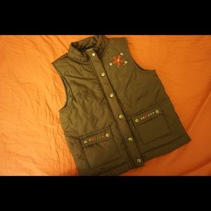 Girls brown flower vest.